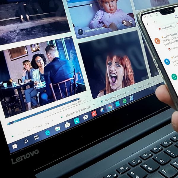 Voob.com.ng 10 person using smartphone and laptop computer